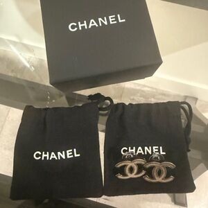 CHANEL Black and Silver Interlocking CC Clip-On Earrings
